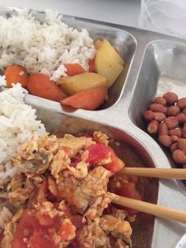 What I eat for dinner almost every day at the school. It only costs $1-$2USD and even though it may not look it, it's delicious!! Those nasty looking eggs and tomatoes are my FAVORITE!