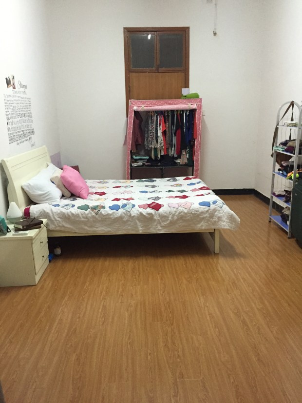 AFTER: It was a long, difficult journey to get three 50 lb bags and a backpack to the other side of the world, but it was worth it. It feels so much more like home to have a quilt my granny made me, pictures, wall stickers, and even my body pillow that I brought in a vacuum sealed bag! You may call this crazy. I call it dedicated.